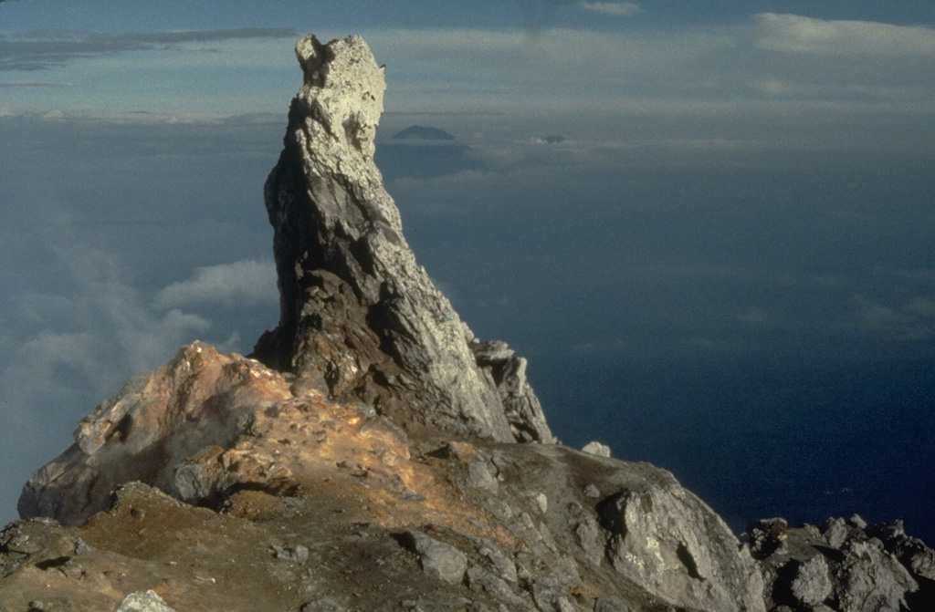This 10-m-high remnant of a lava spine was at the summit of one of Merapi's older lava domes in 1989 and had collapsed by 2006. The slope to the left drops off steeply into Merapi's summit crater. Photo by Tom Pierson, 1989 (U.S. Geological Survey).