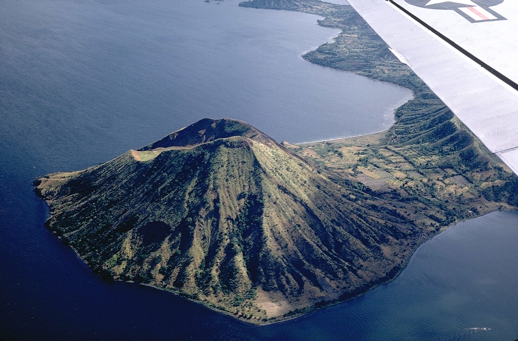 Binintiang Malaki, a cone at the NW tip of Volcano Island, formed during an eruption in 1707. The cone, seen here from the SW, is the largest of the flank cones on Volcano Island. Photo by Kurt Frederickson, 1968 (Smithsonian Institution).