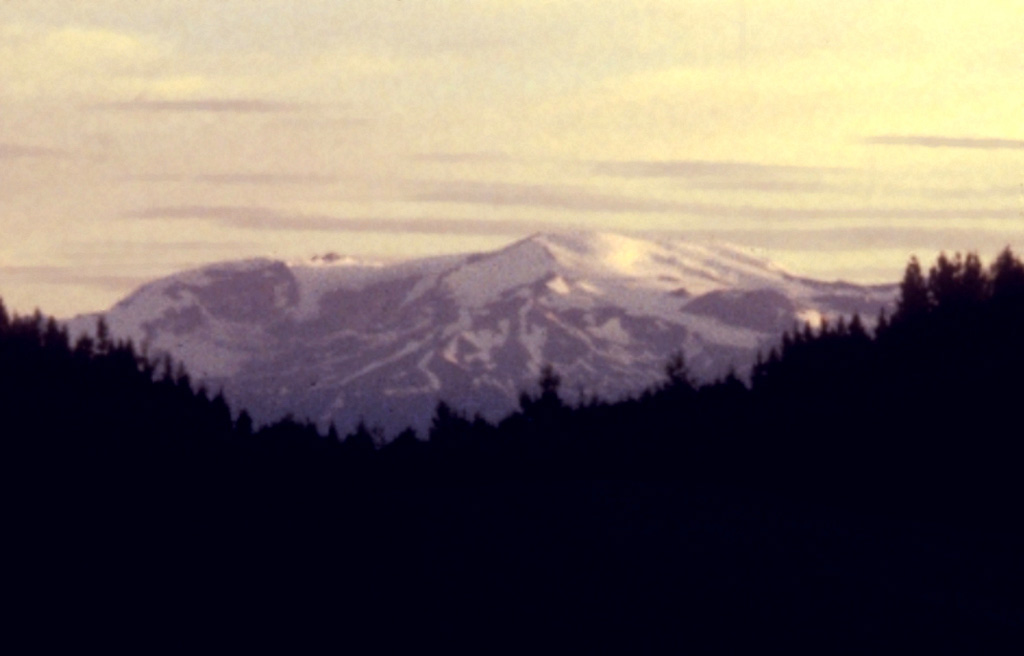 The Mount Edziza complex, seen here from the east along the Cassiar-Stewart Highway, is part of a large volcanic plateau that is the centerpiece of Mount Edziza Provincial Park, one of the largest in British Columbia. The complex was constructed over the past 7.5 million years during five cycles beginning with eruption of alkali basalts and ending with felsic and basaltic eruptions as late about 1,000 years ago. Numerous ice-contact features and products of subglacial eruptions are found in the Mount Edziza complex. Photo by Ben Edwards, 1995 (Dickinson College, Pennsylvania).
