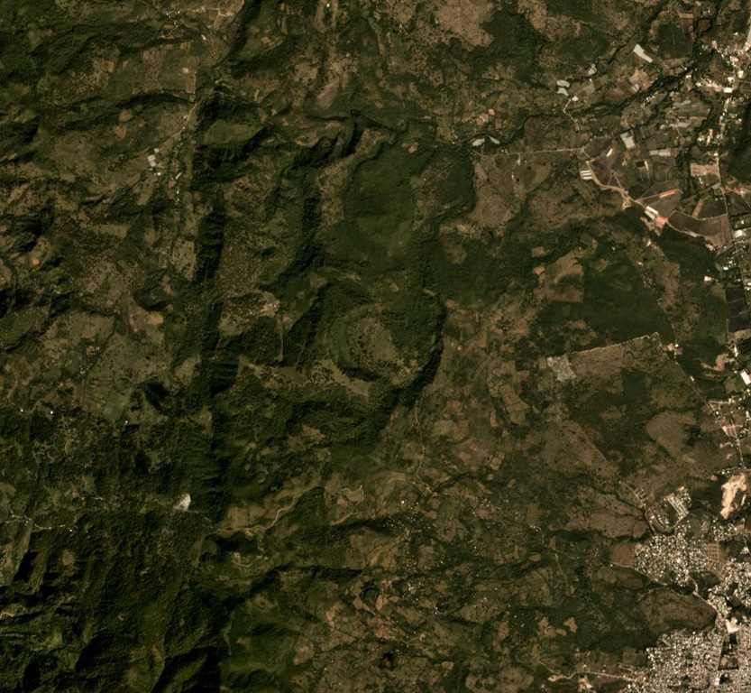 The area NW of the town of Estelí (lower right) contains vegetated lava flows of the Estelí volcanic field, shown in this December 2019 Planet Labs satellite image monthly mosaic (N is at the top; the image is approximately 10 km across). They were mostly erupted from vents in valleys within the northern interior highlands of Nicaragua between the town of Estelí and the border with Honduras. Satellite image courtesy of Planet Labs Inc., 2019 (https://www.planet.com/).