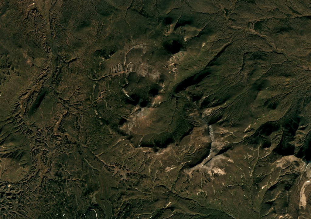 Kell volcano formed within three nested 2-5-km-wide Pleistocene calderas shown in this October 2018 Planet Labs satellite image monthly mosaic (N is at the top; this image is approximately 15 km across). The edifice is composed of several lava domes and cones. Satellite image courtesy of Planet Labs Inc., 2018 (https://www.planet.com/).