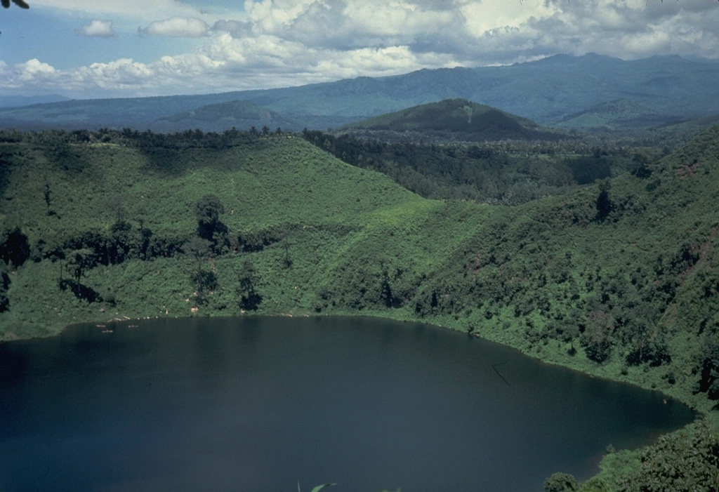 This lake-filled maar on the NE flank of Lamongan is one of 27 surrounding the volcano. Most historical eruptions have originated from the summit crater. Photo by Tom Casadevall, 1987 (U.S. Geological Survey).