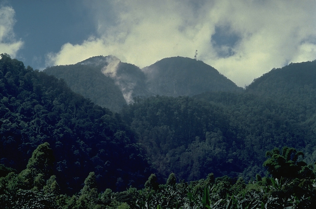 Gunung Ranakah is a group of lava domes in western Flores Island.  A new dome, Anak Ranakah (Child of Ranakah), at the left in this photo, was formed in 1987 in an area without previous historical eruptive activity. Copyrighted photo by Katia and Maurice Krafft, 1988.