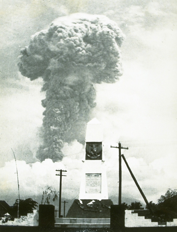 An ash plume towers above Bali's Agung volcano on 12 March 1963. Five days later a devastating eruption produced pyroclastic flows and lahars that killed 1,148 people. Another powerful eruption on 16 May caused additional fatalities. The eruption left tens of thousands homeless. Photo by K. Kusumadinata, 1963 (Volcanological Survey of Indonesia).