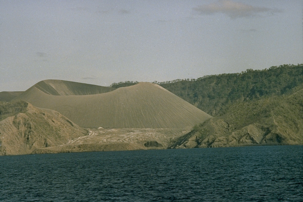An eruption in 1991 dramatically modified the morphology of the central scoria cone on the small Barren Island, one of the Andaman Islands, north of Sumatra. During the eruption the height of the cinder cone was reduced from 305 to 225 m, and the diameter of its crater increased from 60 to about 200 m. Two small scoria cones also formed in the lava field west of the main cone. Photo courtesy of D. Haldar, 1992 (Geological Survey of India).