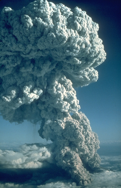 An explosive eruption from Mount St. Helens on 22 July 1980, seen here from the north, produced a Plinian eruption column that rose 16 km above the volcano. At the base of the column ash can be seen rising above a pyroclastic flow traveling down the N flank towards Spirit Lake. This was the third of three explosive pulses on July 22 and lasted more than two hours. Photo by Jim Vallance, 1980 (U.S. Geological Survey).