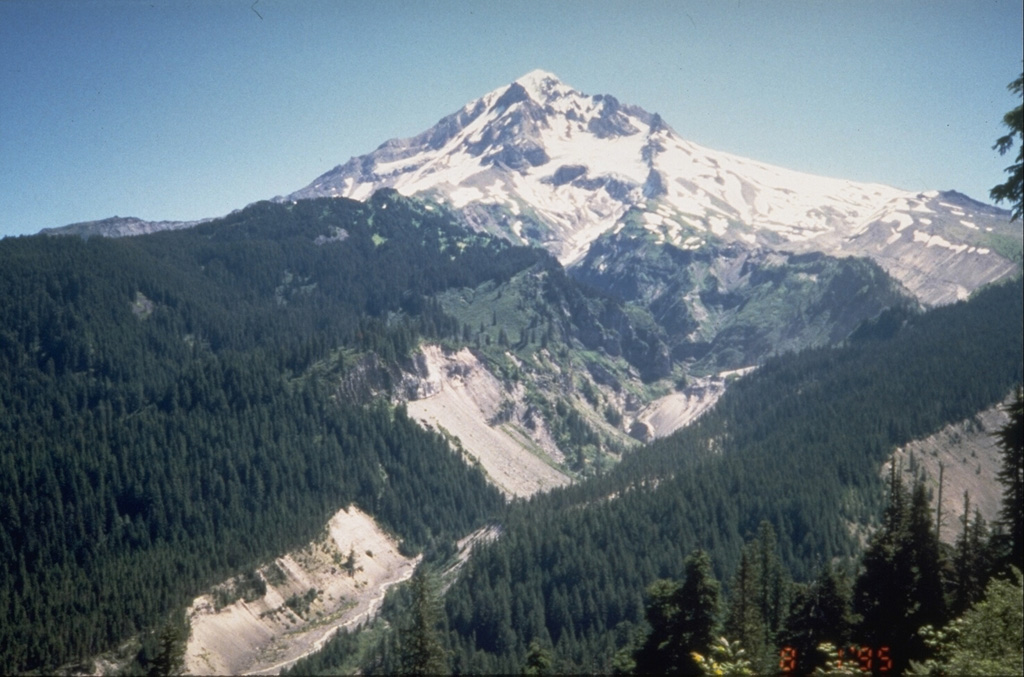 The upper Sandy River valley on the SW side of Mount Hood has been one of the primary channels for lahars and block-and-ash flows during the past 1,800 years. These late-stage eruptions originated from vents and lava domes high on the SW flank. Photo by Willie Scott, 1995 (U.S. Geological Survey).