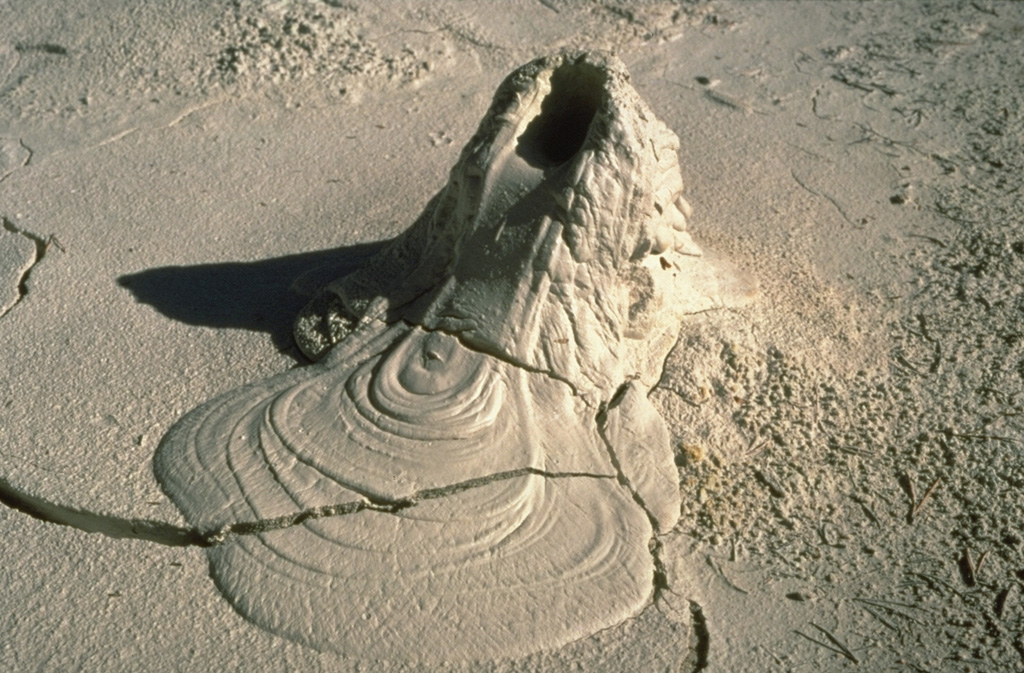 A small mudpot vent in Pocket Basin at the north end of Yellowstone's Lower Geyser Basin produced this intriguing feature that mimics a spatter cone that issued a lava flow. Mudpots form in areas of intense, clay-rich hydrothermal alteration where the thermal system is dominated by gases. Photo by Dan Dzurisin, 1983 (U.S. Geological Survey).