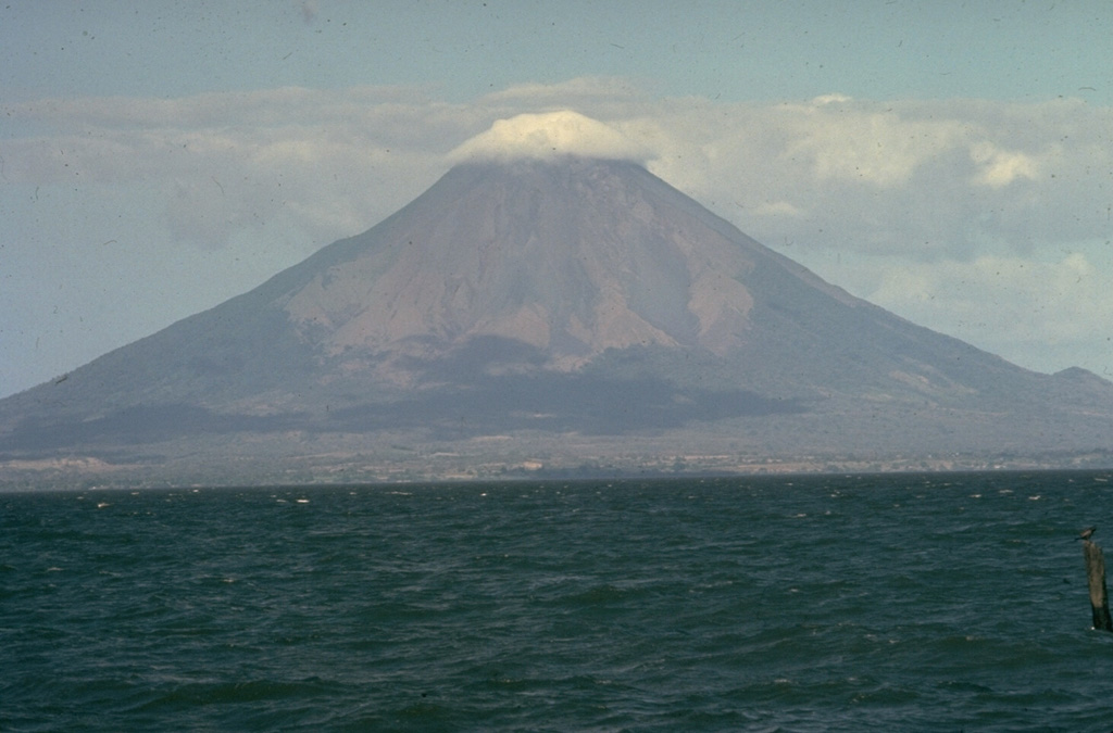Concepción reaches about 1,700 m above Lake Nicaragua and is one of two volcanoes forming Ometepe Island. A small cone is visible on the lower SE flank (far right), one of the scoria cones, lava domes, and a tuff cone formed during flank eruptions. Photo by Moser (courtesy of Jaime Incer).