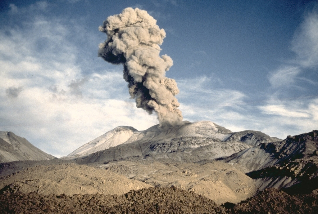 A Vulcanian ash plume, viewed from the SE, rises above Sabancaya volcano in northern Perú on 15 April 1991. Strong explosions were observed at intervals of 20-30 minutes during a visit to the volcano on 13-19 April. The explosions lasted about a minute and produced 3-4 km high ash plumes. Photo by Pierre Vetsch, 1991.