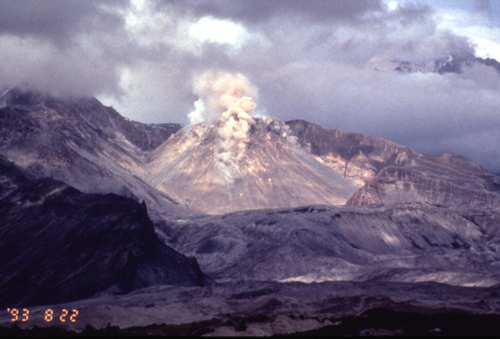 Small plumes rise above rockfalls accompanying renewed lava-dome growth at Sheveluch volcano on 22 August 1993. Intermittent mild explosions with a maximum cloud height of 5 km began on 11 April 1992. A large explosive eruption on 22 April produced an 18-km-high ash plume and pyroclastic flows. Renewed dome growth began that month, and by 27 May the lava dome had doubled its pre-eruption height to 400 m. Dome growth along with intermittent mild explosive activity continued until at least July 1994. Photo by Phil Kyle, New Mexico Institute of Mining and Technology, 1993 (courtesy of Vera Ponomareva, IUGG, Petropavlovsk).