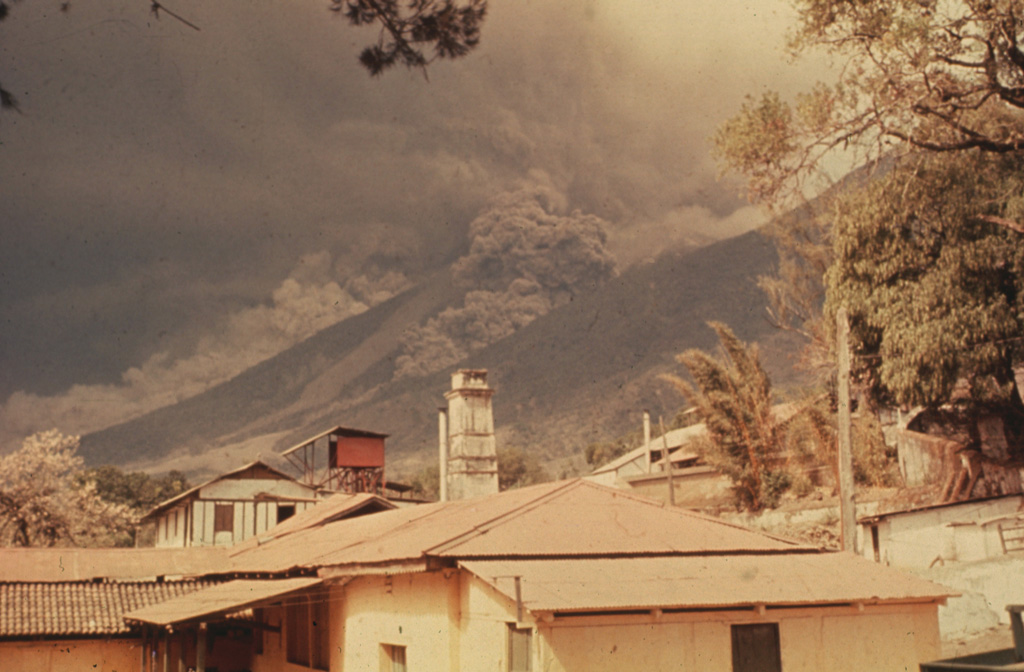 Pyroclastic flows descend the Barranca Honda and an adjacent drainage on the eastern flank of Fuego volcano in February 1973. Following strong steam emissions on 22 February 1973 small eruptions beginning 23 February were accompanied by pyroclastic flows down the Barranca Honda. Explosive eruptions continued until 3 March and resumed 13 and 22-23 March. This photo was taken from Finca Capetillo, near Alotenango.  Photo by Sam Bonis, 1973 (courtesy of Bill Rose, Michigan Technological University).