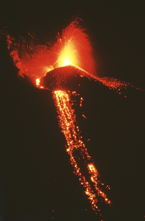 Strombolian eruptions at a spatter cone in Pacaya’s MacKenney crater. Lava flows through a notch in the crater and descends the northern flank. The date of the photo is uncertain, but may have been around 1967. Photo by Alfredo MacKenney (courtesy of Bill Rose, Michigan Technological University).