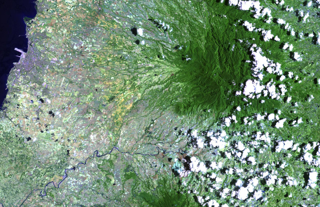 The deeply eroded, forested Mandalagan volcano on northern Negros Island contains a highly altered domed structure. The Bago River at the bottom of the image cuts across the lowlands between Mandalagan and Kanlaon volcano, whose vegetated flanks are visible at the bottom center. NASA Landsat image, 2003 (courtesy of Hawaii Synergy Project, Univ. of Hawaii Institute of Geophysics & Planetology).