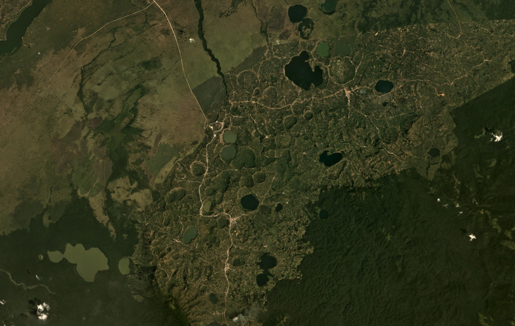 Lakes fill maars of the Bunyaruguru volcanic field, also known as the Kichwambe volcanic field, across this January 2019 Planet Labs satellite image mosaic (N at the top). The field contains over 130 craters and is located between Lake Albert and Lake Edward in Uganda. Satellite image courtesy of Planet Labs Inc., 2019 (https://www.planet.com/).