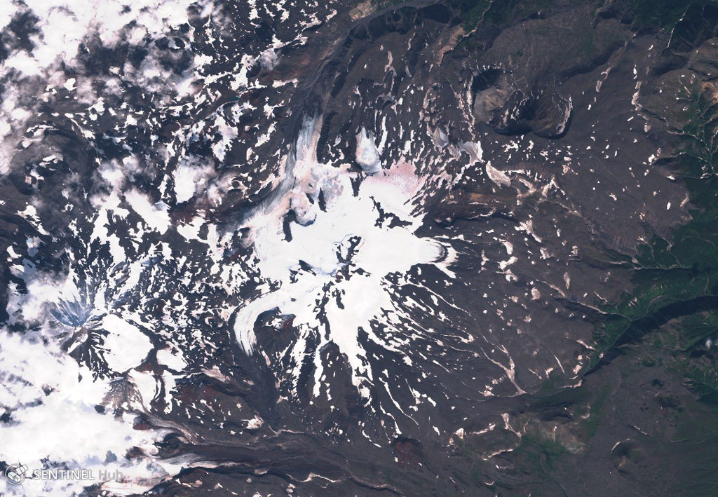 Snegovoy is one of the northernmost volcanoes in Kamchatka, seen here in this 5 September 2019 Sentinel-2 satellite image (N is at the top). The glaciated edifice is primarily constructed of lava flows. This image is approximately 22 km across, with Ostry volcano to the lower left. Satellite image courtesy of Copernicus Sentinel Data, 2019.