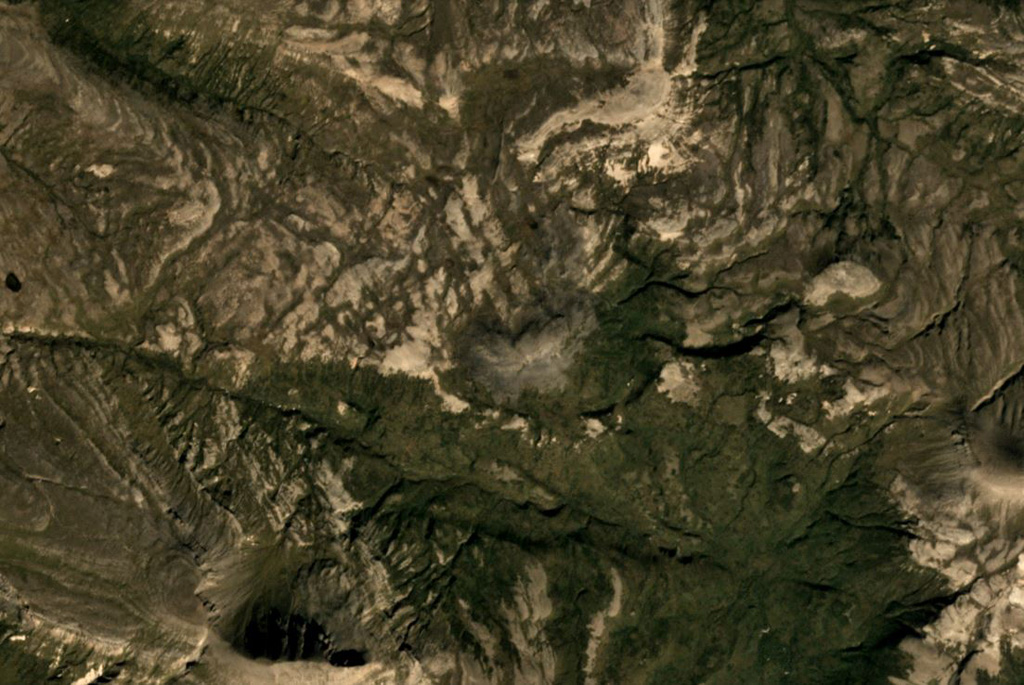 A small unnamed lava dome and an associated lava flow is located near the center of this Planet Labs September 2019 satellite image mosaic (N is at the top). The dome lies near the head of Big Alinchak Creek, NW of Alinchak Bay, and does not show evidence of glacial erosion. Satellite image courtesy of Planet Labs Inc., 2019 (https://www.planet.com/).