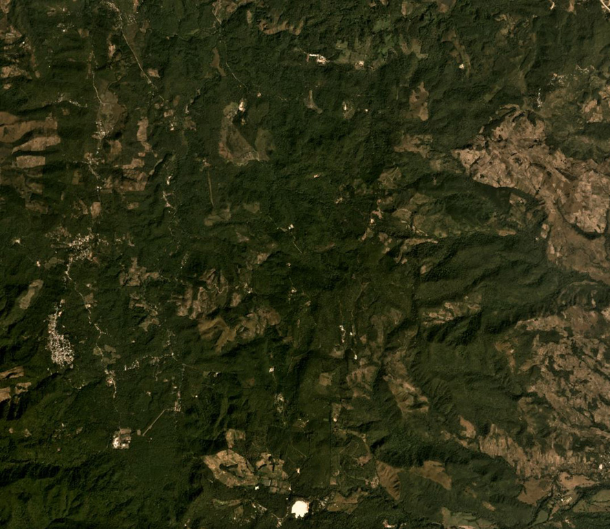 The Pleistocene Piedra Grande is the topographically indistinct area in the center of this  December 2019 Planet Labs satellite image monthly mosaic (N is at the top; image is approximately 14 km across). The complex consists of heavily eroded, faulted cones, and has undergone extensive hydrothermal alteration. Satellite image courtesy of Planet Labs Inc., 2019 (https://www.planet.com/).