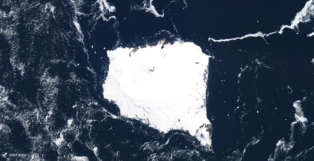 The glaciated 12 x 12 km Montagu Island in the South Sandwich Islands is shown in this 2 December 2019 Sentinel-2 satellite image (N is at the top). The highest point is Mount Belinda near the northern coastline with the dark crater apparent here, which appears to have formed within a 6-km-diameter, ice-filled caldera. The SE peninsula is Mount Oceanite. Satellite image courtesy of Copernicus Sentinel Data, 2019.