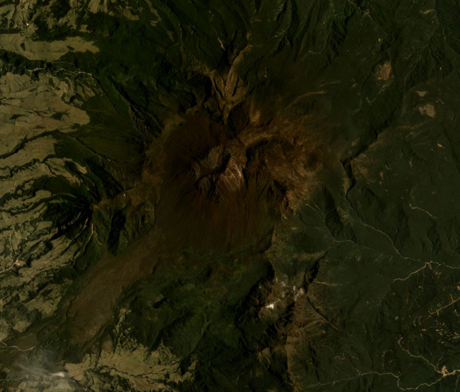 The Doña Juana complex in Colombia is shown in this September 2017 Planet Labs satellite image monthly mosaic (N is at the top; this image is approximately 8 km across). The summit area is shaped by a large scarp that has been infilled by lava domes, which have subsequently undergone collapse events to produce block-and-ash flow deposits. Satellite image courtesy of Planet Labs Inc., 2017 (https://www.planet.com/).