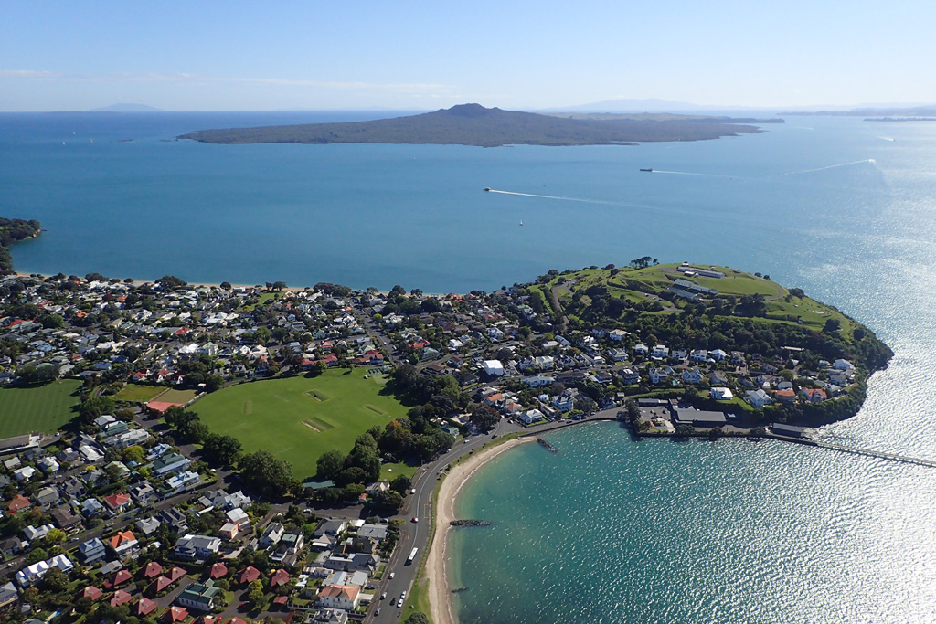 This 2018 photo from the SW shows the North Head or Maungauika scoria cone and Rangitoto in the background. Rangitoto is the largest volcanic feature in the Auckland Volcanic Field and unlike the other monogenetic centers, it formed over at least two eruptive episodes. Photo by Bruce Hayward, 2018.