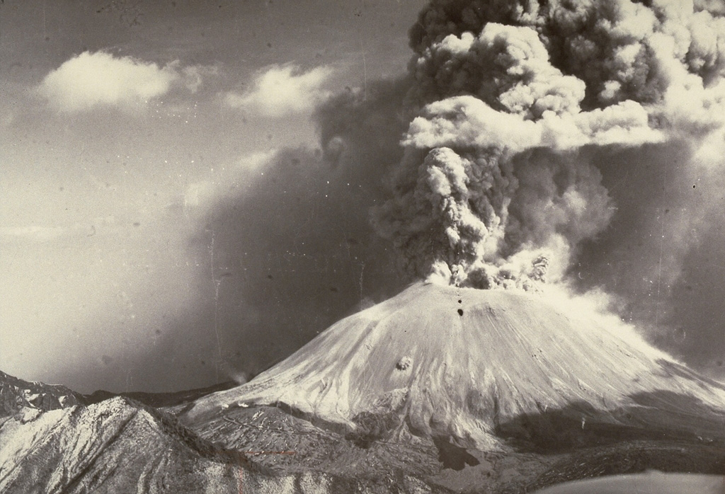 An ash plume rises above the summit of Vesuvius in 1944, near the end of a long-duration eruption that began in 1913. The 1944 eruption produced voluminous lava flows and vigorous explosions that excavated a 300-m-deep crater at the summit. The paroxysmal phase began on 18 March 1944 and ended on 4 April. Photo by U.S. Navy, 1944.