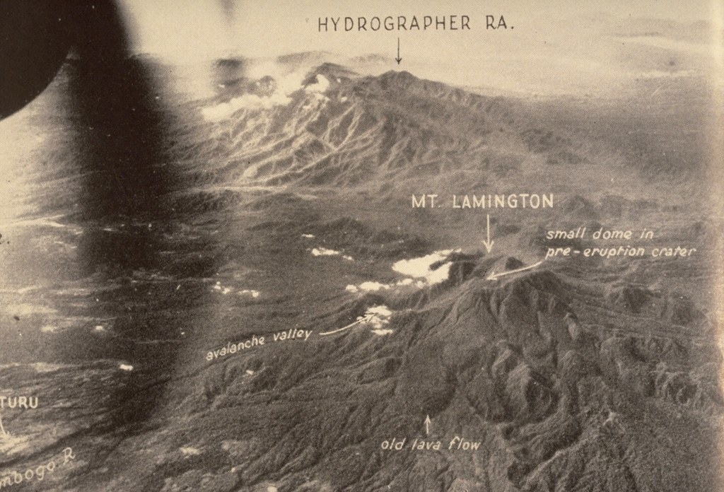The Hydrographers Range, seen here from the W, is a forested, deeply dissected volcanic massif extending from the E margin of Mount Lamington (lower right) to the northern coast of Papua New Guinea. Most activity took place during the Pleistocene, but well-preserved scoria cones and craters suggest that some Holocene activity occurred. This 1947 photo was taken prior to Lamington's catastrophic eruption in 1951. Photo by Royal Australian Air Force, 1947 (published in Taylor, 1958).