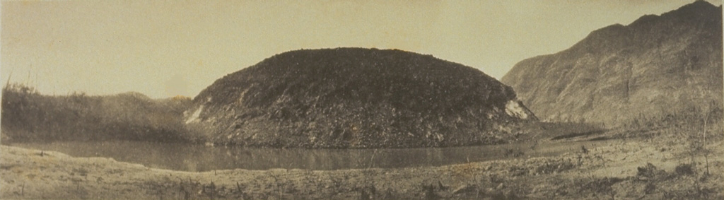 Three days after a small explosive eruption on 17 July 1918 a lava dome formed above the surface of the lake, filling the crater. By the time the eruption ended on 30 July the dome had grown to a height of 85 m and to a width of 440-560 m. The lava dome was later destroyed by explosive eruptions in 1982. Photo from Van Es and Taverne (1924) courtesy Tom Casadevall (U.S. Geological Survey).