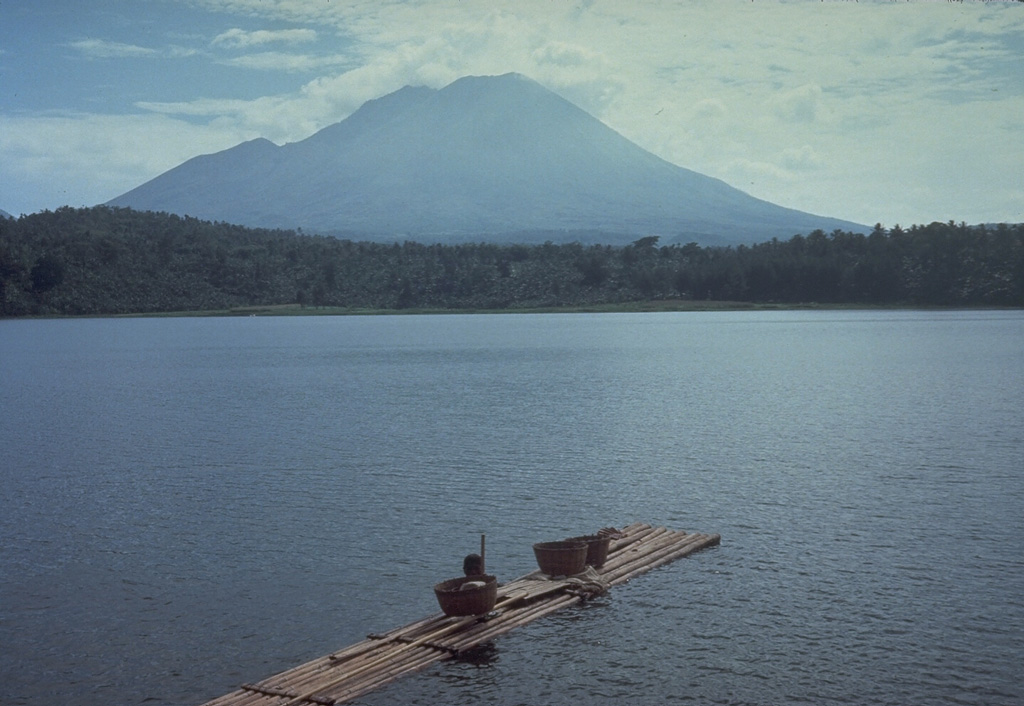 Lamongan, a small volcano located between the massive Tengger and Iyang-Argapura volcanoes, rises above Lamongan Lake on its western flank. Ranu Lamongan lake fills one of 27 maars that surround the volcano, that have diameters ranging from 150 to 700 m. There have been frequent explosive eruptions, mostly from the summit crater, during the 19th century. Photo by Tom Casadevall, 1985 (U.S. Geological Survey).