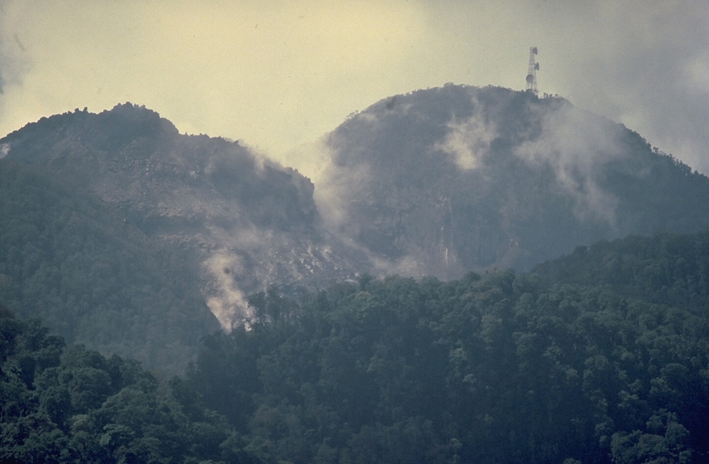 Anak Ranakah (Child of Ranakah) lava dome on the left was formed in 1987 next to the larger Ranakah lava dome on the right. Copyrighted photo by Katia and Maurice Krafft, 1988.