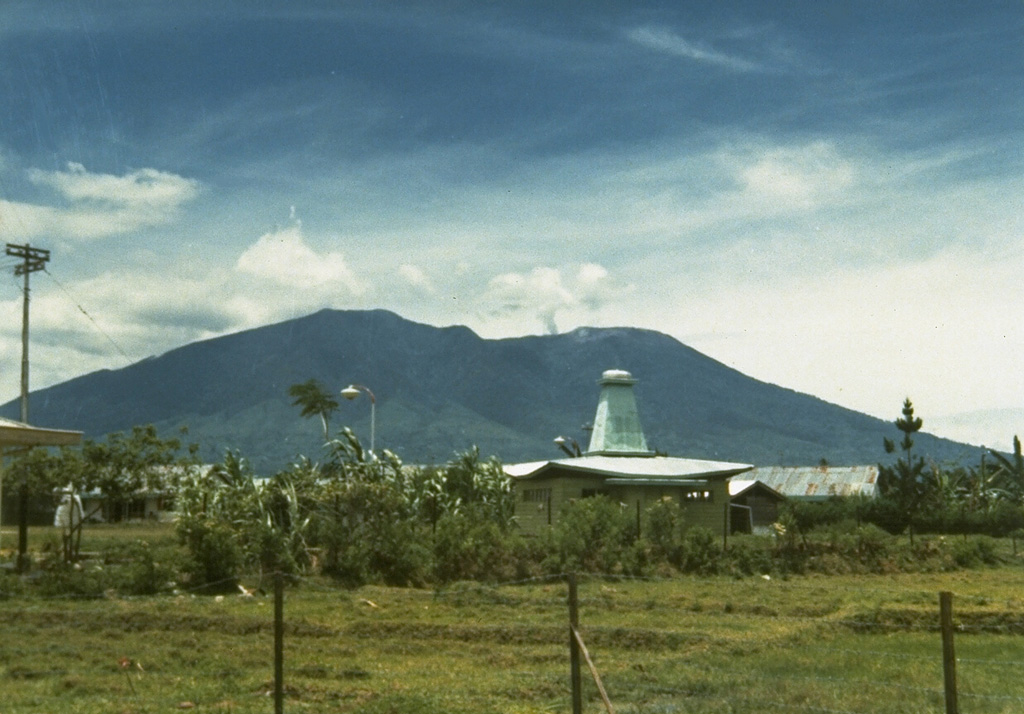 Marapi, seen here from the W, has multiple summit craters along an E-W line. Marapi has produced frequent small-to-moderate explosive eruptions since the end of the 18th century. Gunung Marapi is not to be confused with the more well-known Merapi volcano on Java. Photo by J. Matahelumual, 1978 (Volcanological Survey of Indonesia).