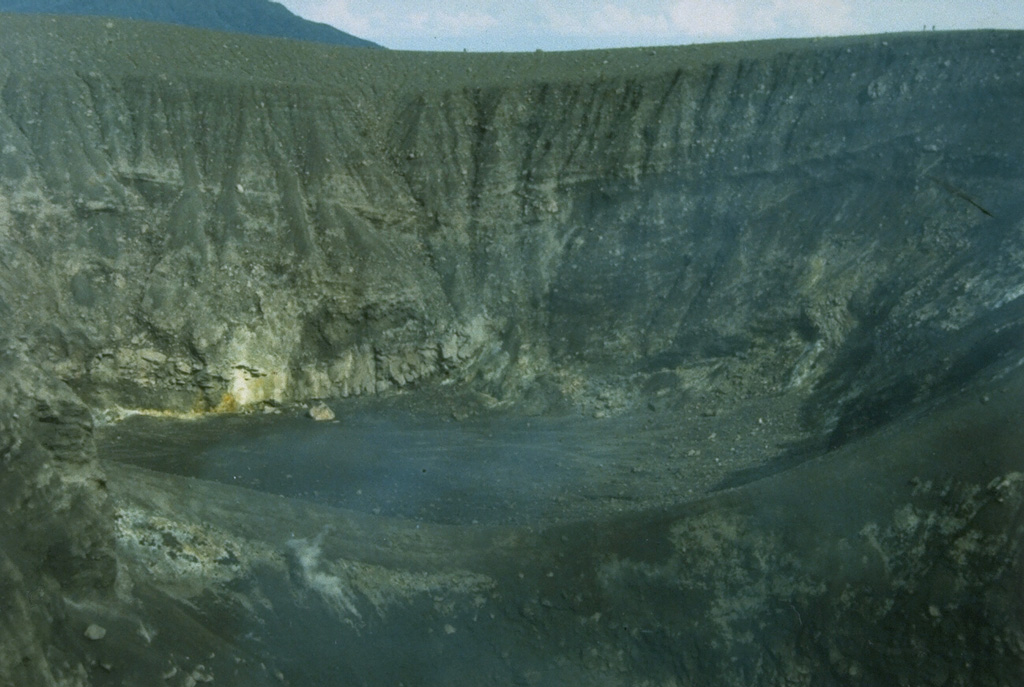 The 325-m-wide Kepundan Bongsu, one of several historically active craters at the summit of Sumatra's Marapi volcano, is the largest and westernmost of a chain of craters covering a 1.2-km-long E-W line. Marapi is one of Sumatra's most active volcanoes, producing numerous small-to-moderate explosive eruptions since the end of the 18th century. Photo by Gede Suantika, 1992 (Volcanological Survey of Indonesia).