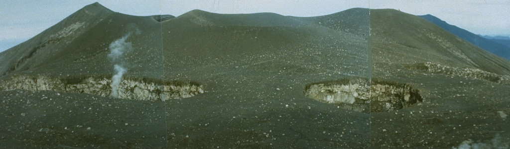 Three small craters, Kepundan A, B, and C, seen here right-to-left, respectively, from the E, are oriented transverse to the elongated E-W-trending summit of Marapi volcano in Sumatra. A plume rises from Kepundan C. The craters are among the many vents at Marapi that have been active during historical time. Photo by Gede Suantika, 1992 (Volcanological Survey of Indonesia).