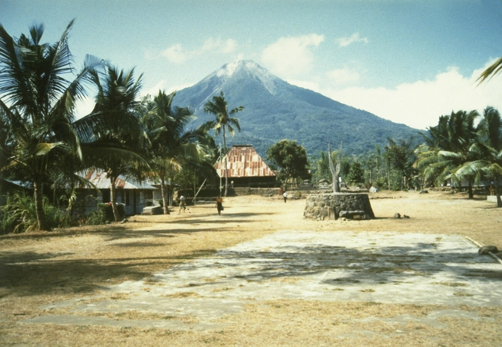 Ebulobo above the village of Boa Wae, located below the NW flank of the volcano. Ebulobo is located in central Flores Island and has a summit lava dome. Historical eruptions, recorded since 1830, include lava emission down the N flank and explosive eruptions from the summit crater. Photo by Willem Rohi, 1991 (Volcanological Survey of Indonesia).