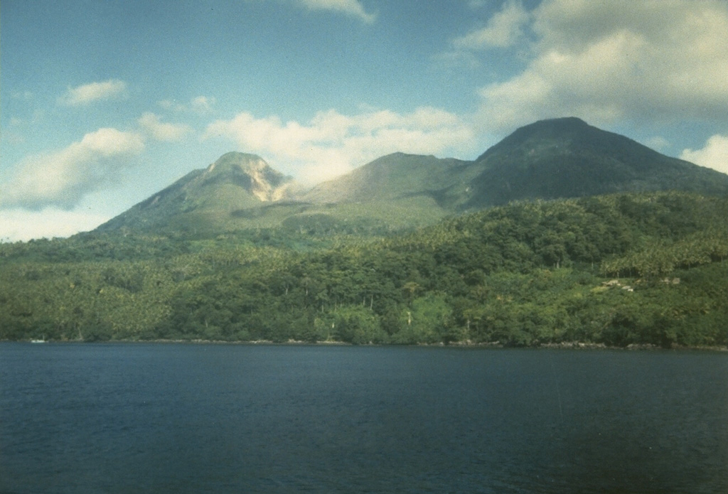 Wurlali volcano (also referred to as Damar), seen here from Cape Wilhelmus on the north, is part of Indonesia’s Banda Island chain. The stratovolcano was formed in the northern part of a 5-km-wide caldera. During historical time only a single explosive eruption occurred in 1892 from the summit crater. Photo by K. Sumaryano, 1994 (Volcanological Survey of Indonesia).