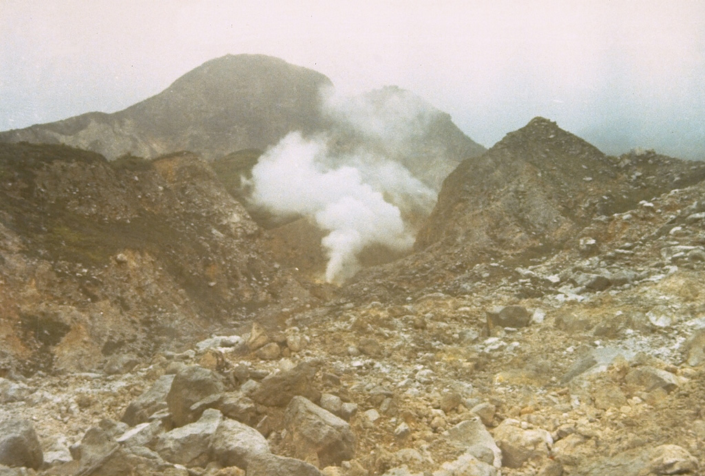 This fumarole, located on the SE side of the summit, is the largest in the five solfatara fields at the summit of Ambang volcano. Photo by Ruska Hadian, 1973 (Volcanological Survey of Indonesia).