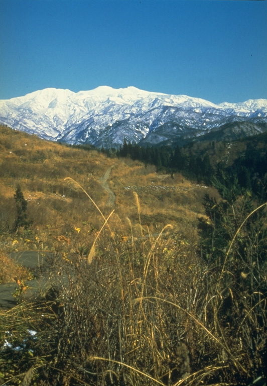 Eruptions at Hakusan occur at multiple vents along a roughly N-S line; the volcano is viewed here from the W. Holocene eruptions have consisted of phreatic or phreatomagmatic explosions at several summit craters. Historical eruptions were recorded over almost a thousand-year period until the 17th century. Photo by Ishikawa Prefecture, 1983 (courtesy Toshio Higashino, Haku-san Nature Conservation Center).