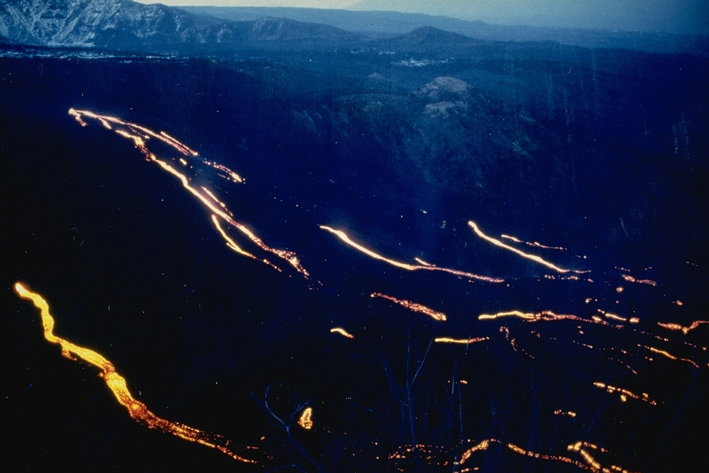 Lava flows descending the Valle del Bove on Mount Etna on 16 March 1992, observed from Monte Pomiciaro Belvedere on the S rim. The eruption, which had begun in December 1991, lasted more than 16 months and was the most voluminous at Etna during the past 300 years. Photo by Jean-Claude Tanguy, 1992 (University of Paris).