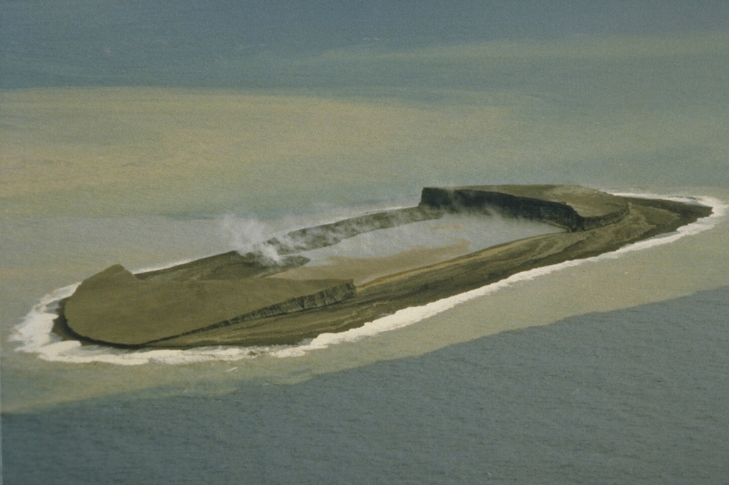 An eruption of Home Reef in the Tonga Islands in March 1984 produced an island with an estimated size of 500 x 1,500 m and a height of 30-50 m. A plume to 12 km height was reported during the 1-5 March eruption and large amounts of floating pumice were later encountered by passing ships. This photo, taken on 23 March 1984, shows water discoloration surrounding the ephemeral island. Photo by P.J.R. Shepherd (Royal New Zealand Air Force; courtesy of John Latter, DSIR, published in SEAN Bull., 1984).