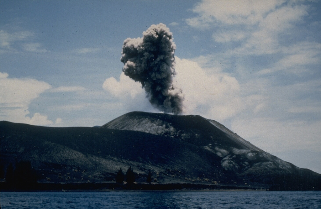An ash plume rising above Anak Krakatau on 2 March 1988, was part of an eruption that produced explosive and effusive activity from mid-February until April. The eruption took place from a fissure on the SSE side of the 1960-61 scoria cone. Photo by Klaus Mehl, 1988 (Ruhr University, Germany).