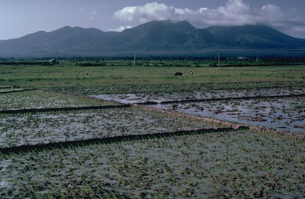 The linear Pocdol Mountains lie between Saragon Bay and the Albay Gulf in southern Luzon. This view is from the S, near the town of Sosogon. A geyser and fumaroles are located near the summit. Little is known of their geologic history. Photo by Chris Newhall (U.S. Geological Survey).