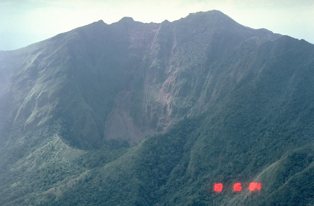 This view looks W into the Iriga crater that formed at the base of the 600-m-high headwall scarp of a flank collapse during a Holocene eruption.  Photo by Chris Newhall (U.S. Geological Survey).