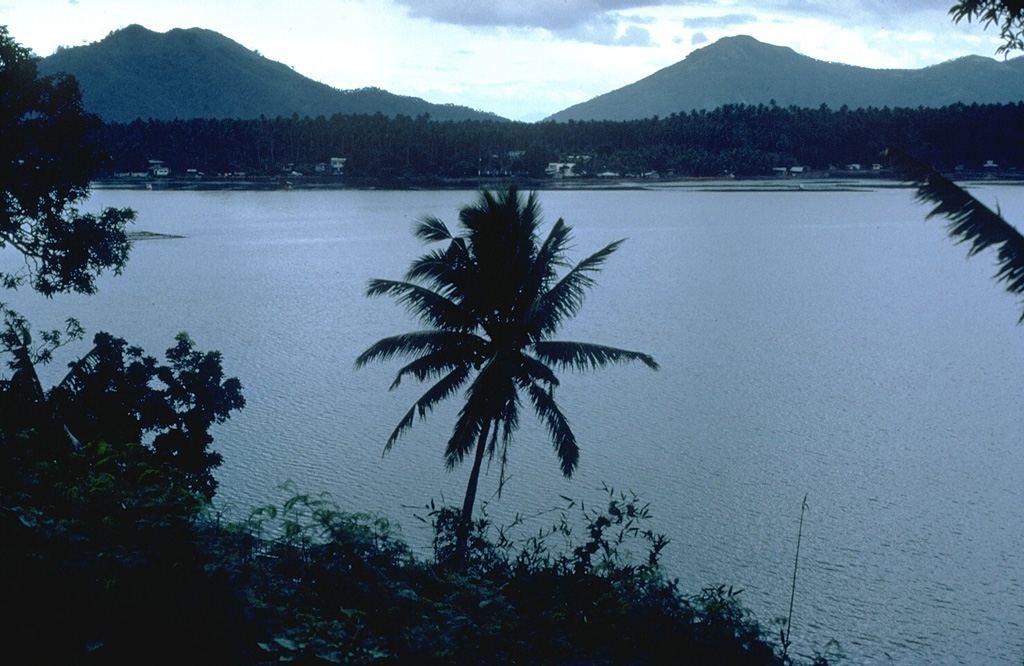 Local legends suggest that the latest eruption of the San Pablo volcanic field took place about 500-700 years ago, forming the Sampaloc Lake maar. This 1.2-km-wide maar, seen here from the S, is one of the largest of a group of 36 maars in the volcanic field. Photo by Chris Newhall, 1989 (U.S. Geological Survey).
