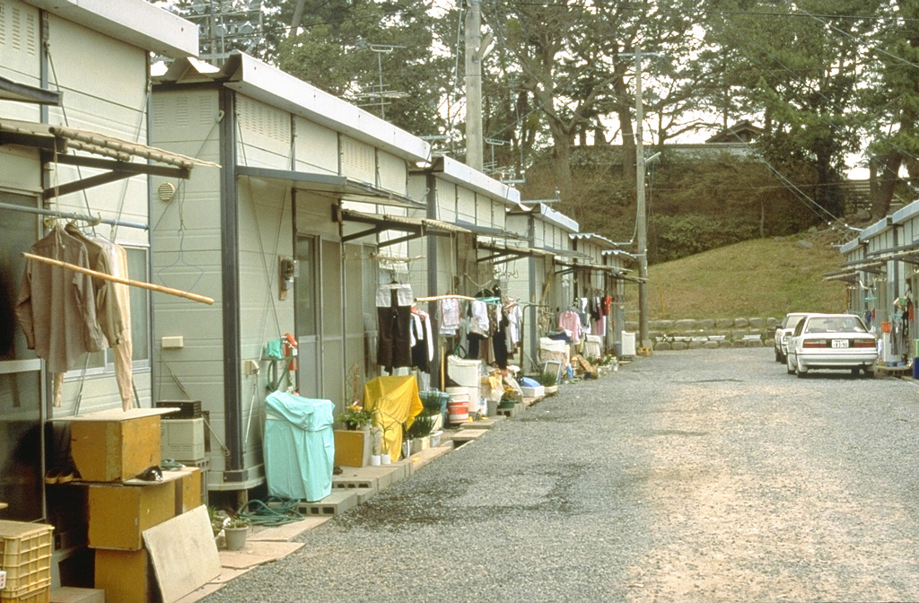 Up to 12,000 people were evacuated at various times because of the lengthy eruption of Unzen that began in 1990. Several thousand people faced long-term evacuation that resulted in living in government-constructed resettlement houses such as these.  Photo by Steve Brantley, 1993 (U.S. Geological Survey).