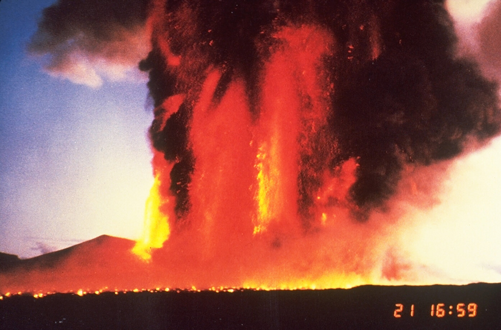 Lava fountains on 21 November 1996 reached 1.6 km above a fissure on the northern flank of Miharayama at Izu-Oshima. The horizontal line in the foreground is an advancing lava flow produced by molten ejecta from the fountains. The 1986 eruption began on 15 November with lava fountaining and lava flows lasting four days. Photo by Katsuyuki Abe, 1986 (courtesy of the Volcanological Society of Japan).