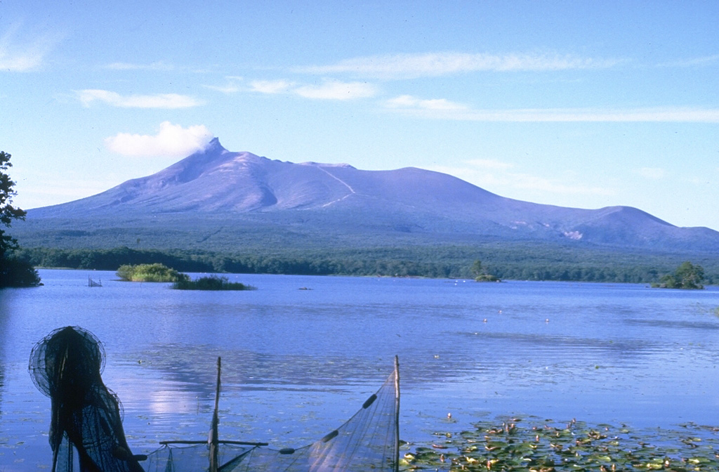 Komagatake on the Oshima Peninsula of southern Hokkaido rises to the N above Lake Onuma and is one of the most active volcanoes of Japan's northernmost island. The summit formed as a result of edifice collapse and hummocky debris avalanche deposits were responsible for the formation of Lake Onuma. A period of more frequent explosive activity began with a major explosive eruption in 1640. Photo by Ichio Moriya (Kanazawa University).