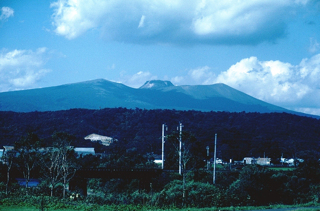 Tarumai volcano, seen here from the SW contains a flat-topped lava dome that formed during an eruption in 1909. The dome was emplaced within a small caldera at the summit that formed during major explosive eruptions in 1667 and 1739 CE. Photo by Tom Simkin, 1981 (Smithsonian Institution).