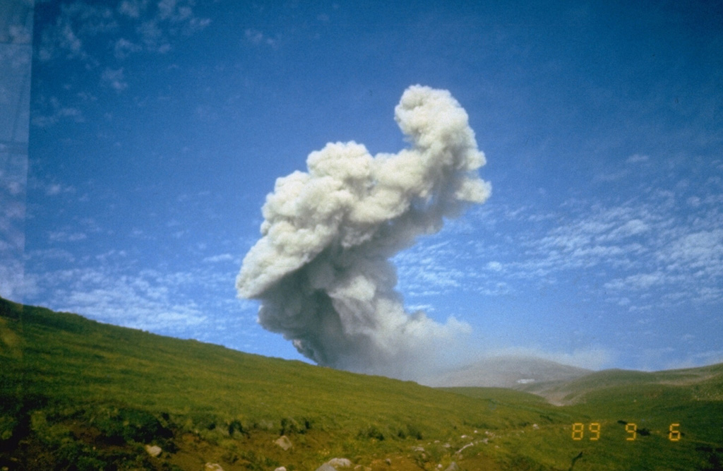 An ash plume rises above the North crater of Ebeko volcano at the northern end of Paramushir Island on 9 September 1989. An explosive eruption that began on 2 February 1989 continued until April 1990. Three summit craters located along a SSW-NNE line form the main edifice at the northern end of a complex consisting of five cones. Activity recorded since the late 18th century has included small-to-moderate explosive eruptions from the summit craters. Photo courtesy of Kamchatka Volcanic Eruptions Response Team, 1989.