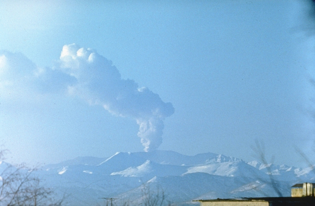 A plume rises above Gorely volcano in February 1985, seen here from the N. Intermittent minor ash eruptions began in August 1984 and lasted until September 1986. Steam-and-gas plumes, sometimes containing minor ash, rose 2 km and the eruption deposited fresh ash on the flanks. Photo by Oleg Volynets, 1985 (Institute of Volcanology, Petropavlovsk).