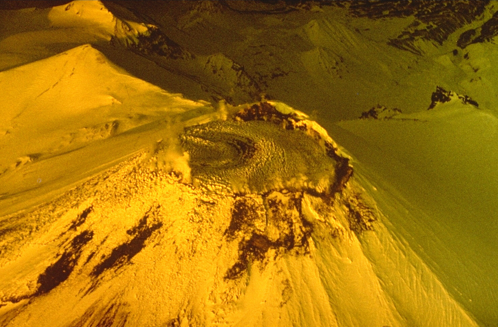 Lava from a 13-30 January 1991 eruption fills the summit crater of Avachinsky in this spring 1991 aerial photo from the south. Prior to the eruption the 400-500 m wide crater was about 250 m deep. Photo by V.N. Nechaev, 1991 (courtesy of Oleg Volynets, Institute of Volcanology, Petropavlovsk).